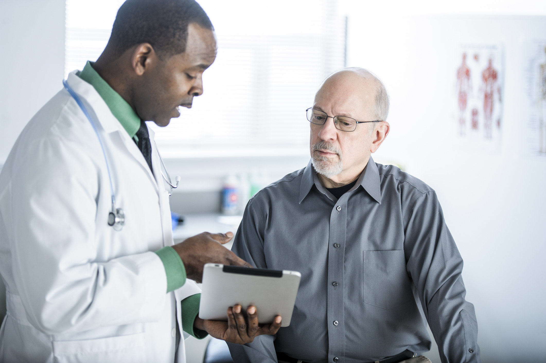 A doctor explaining something to a patient