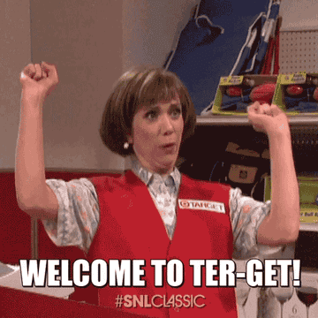 gif of kristen wiig as target lady on SNL saying &quot;welcome to target woohoo&quot;