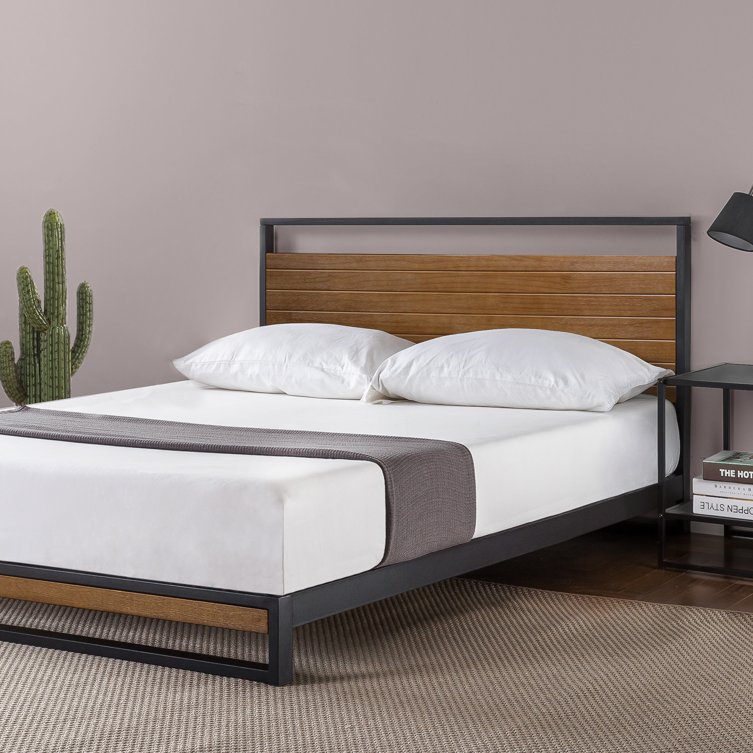 a bedframe with metal frame and wooden headboard