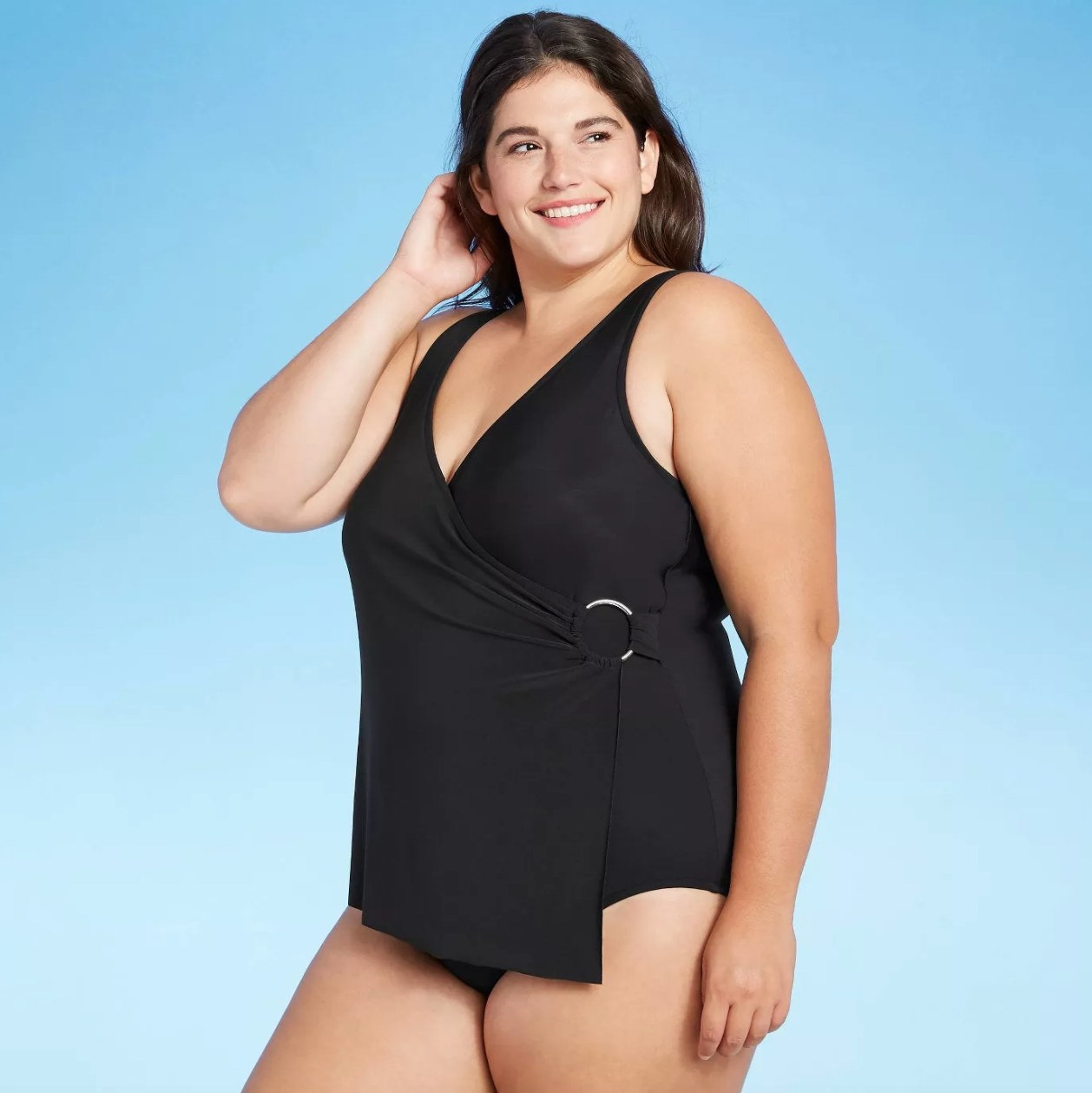 model wearing black wrap front swimsuit