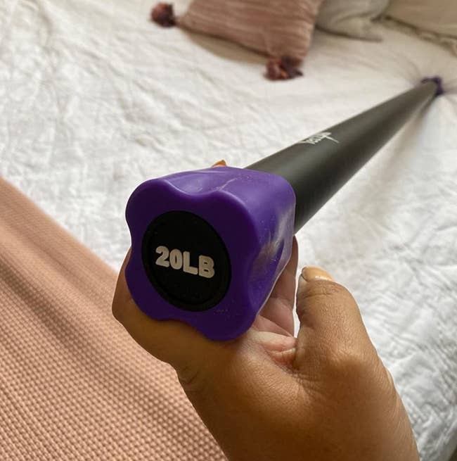 Review photograph of the 20-pound full assemblage weighted workout bar