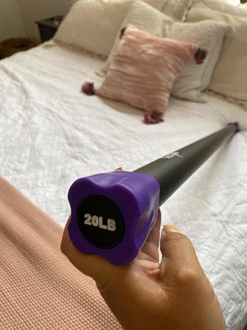 Review photo of the 20-pound total body weighted workout bar