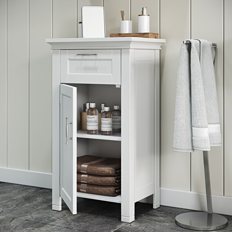 white bathroom cabinet with drawer and two shelves inside