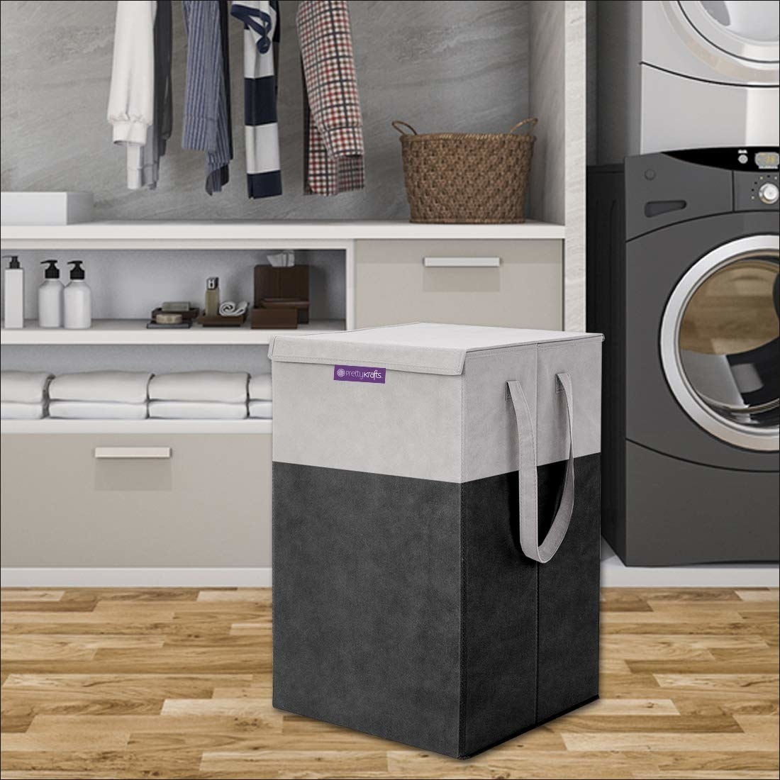 A grey laundry bag with some laundry supplies beside it and a washing machine
