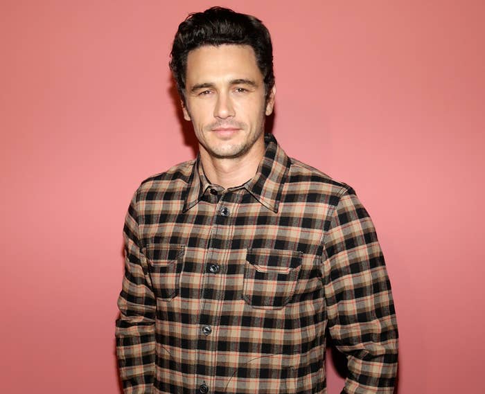James casually dressed in a flannel-type checkered shirt