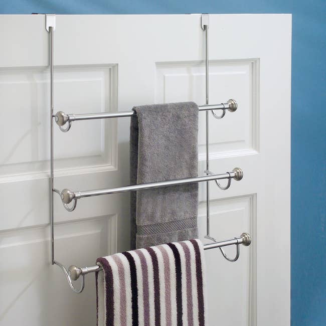 An over-the-shower door towel rack