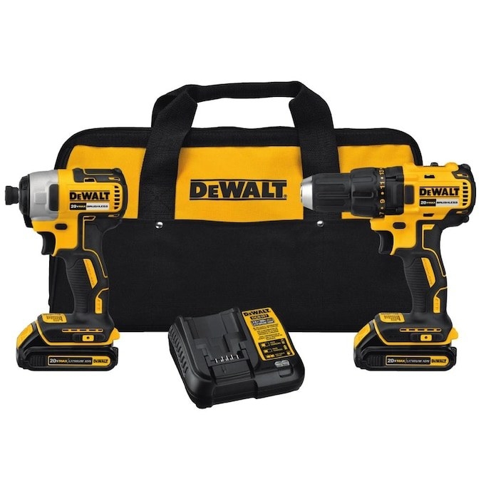 a dewalt tool kit with two drills, a charger, and a yellow and black bag