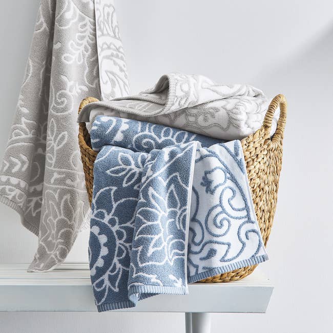The floral printed towel in blue and gray
