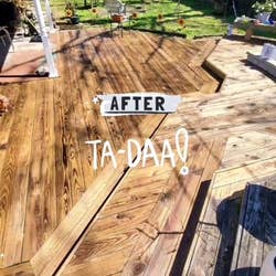 reviewer's clean deck after using a power washer