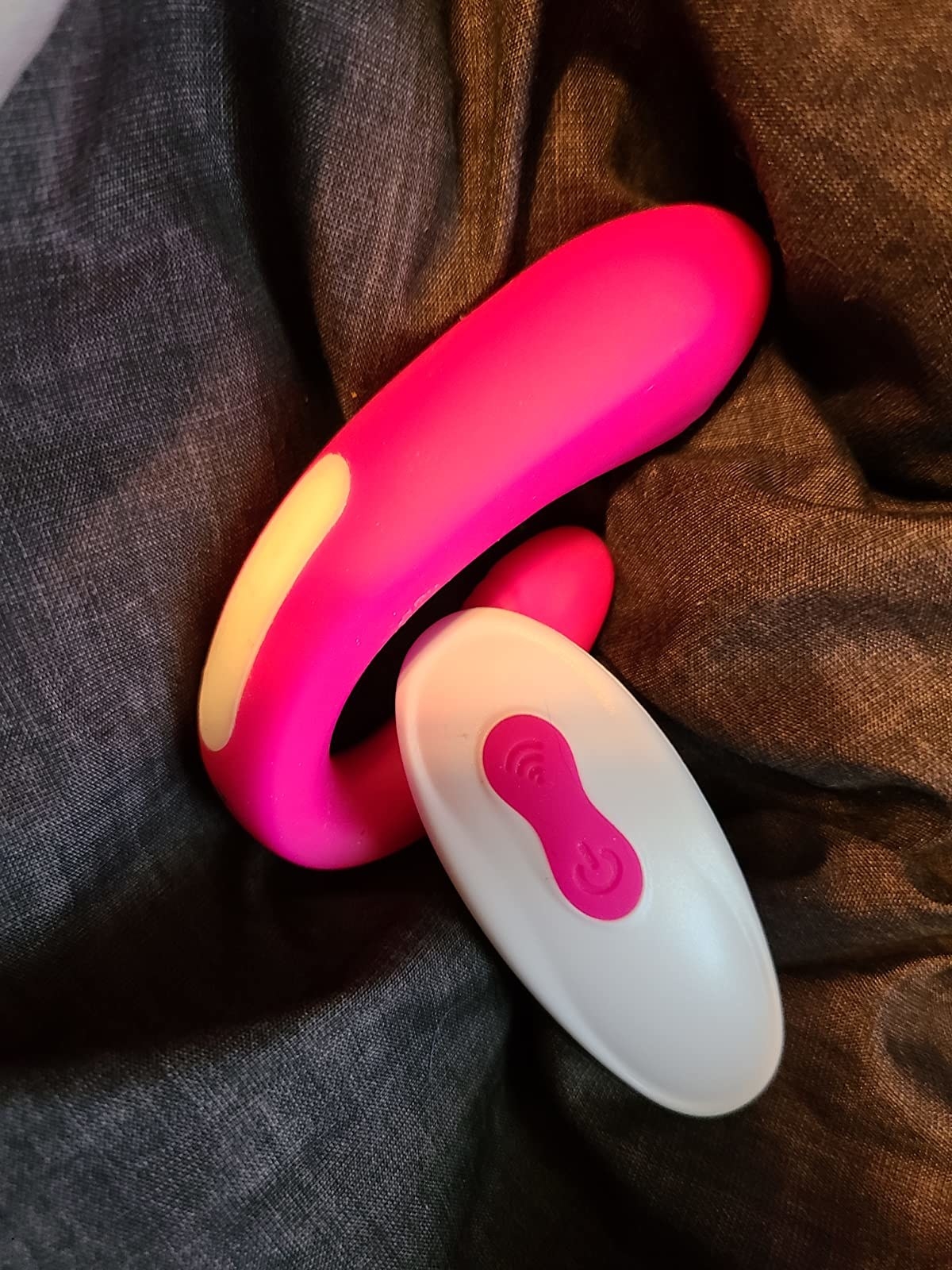 Pink vibrator and white remote control