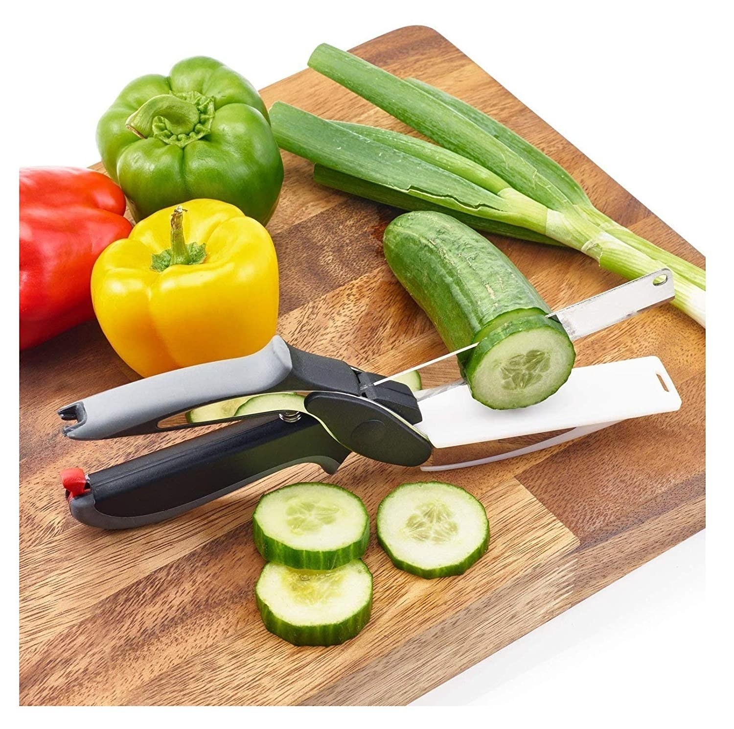 The spring action knife being used to cut cucumber.