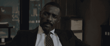 Idris Elba looks inquisitive on set of &quot;Molly&#x27;s Game&quot;