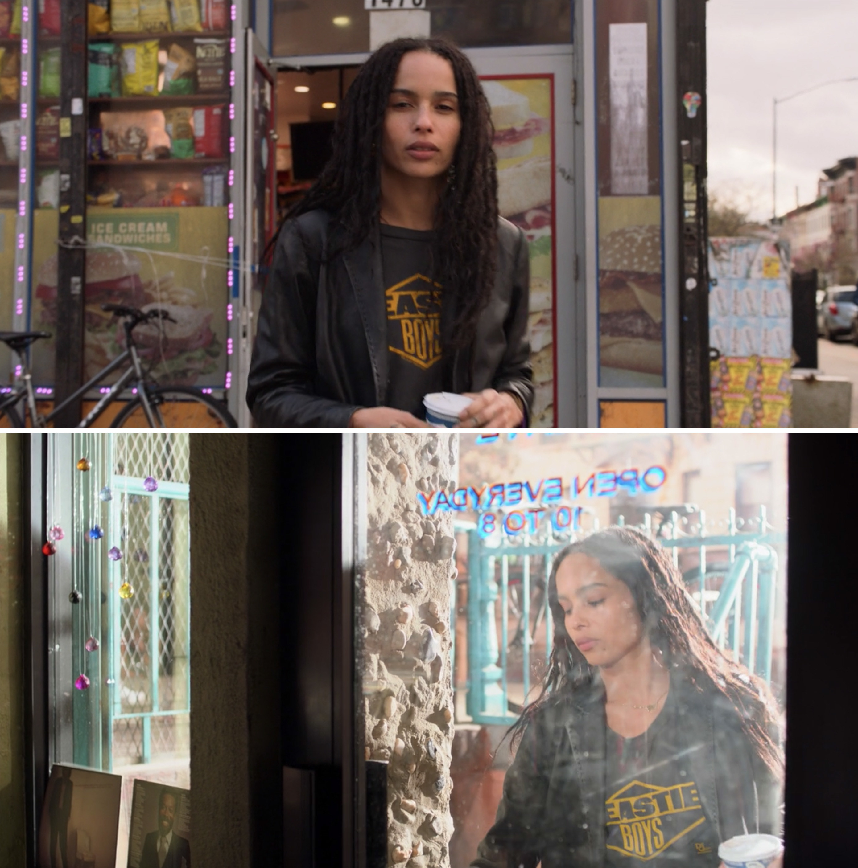 Rob standing on the street and entering her record store