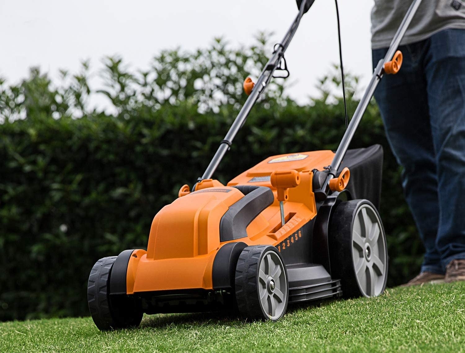 Orange and black lawnmower