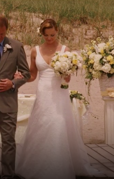 Jane wearing a wedding dress with thick straps