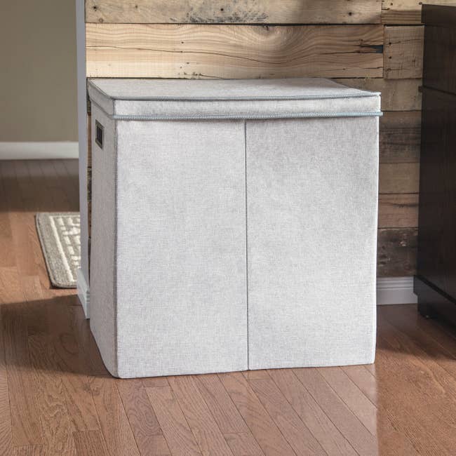 An image of a collapsible double sorter bathroom laundry hamper