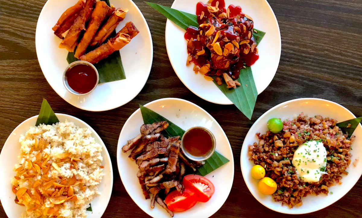 Birds-eye view of plates with Filipino food
