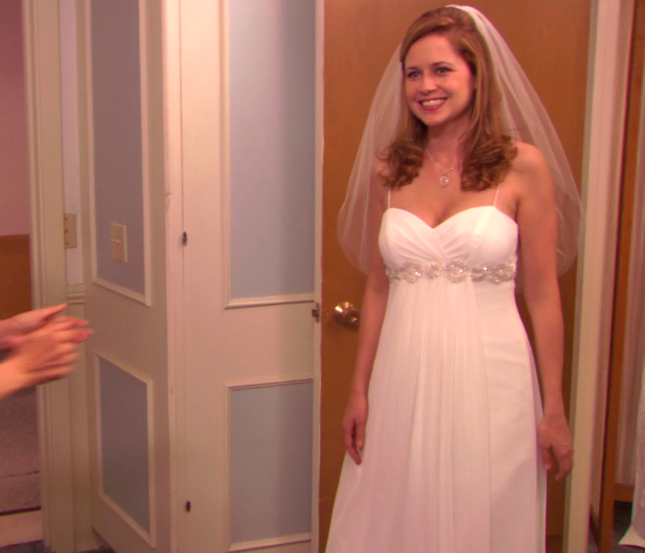 Pam wearing a dress with spaghetti straps
