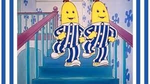 Bananas in striped pajamas coming down the stairs
