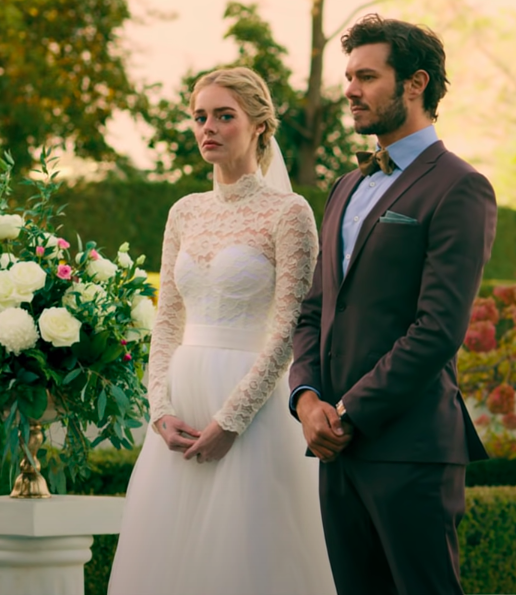 Grace wearing a long-sleeve dress with a bodice and a flare skirt