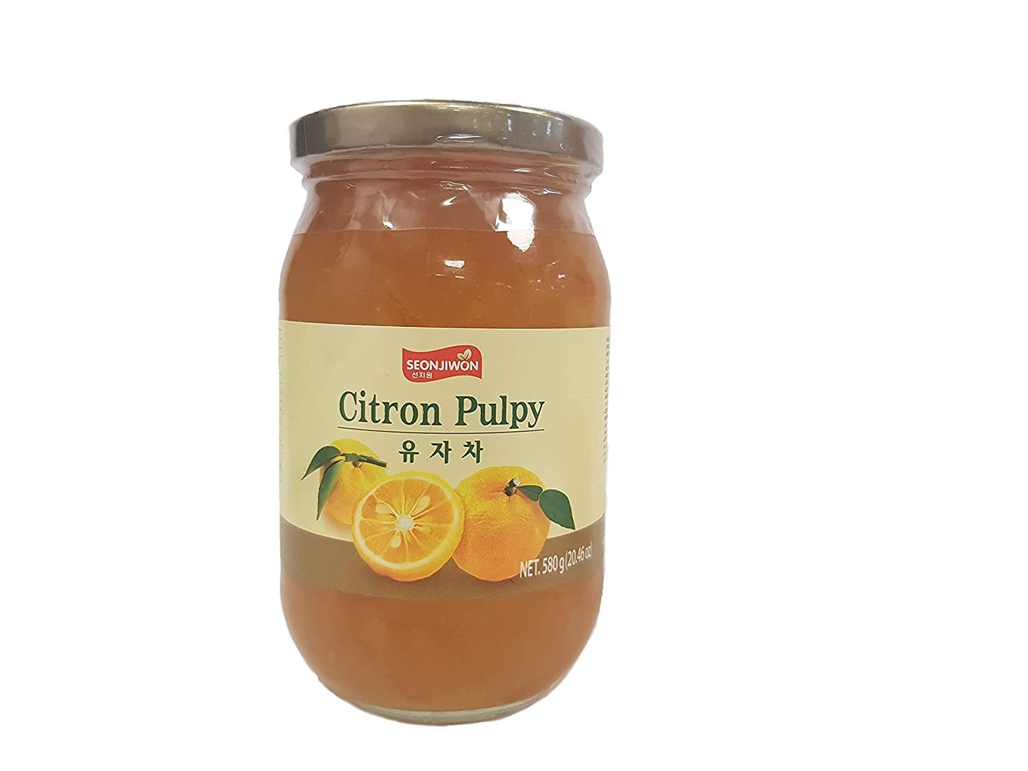 A glass jar of Citron pulp and honey tea.