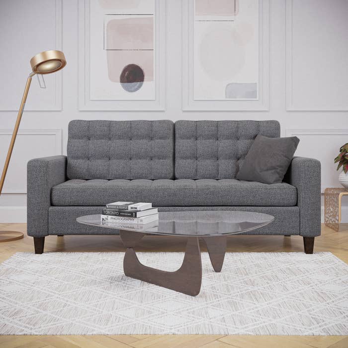 the grey sofa in a living room