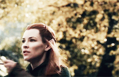 Tauriel from The Hobbit, aiming her arrow.