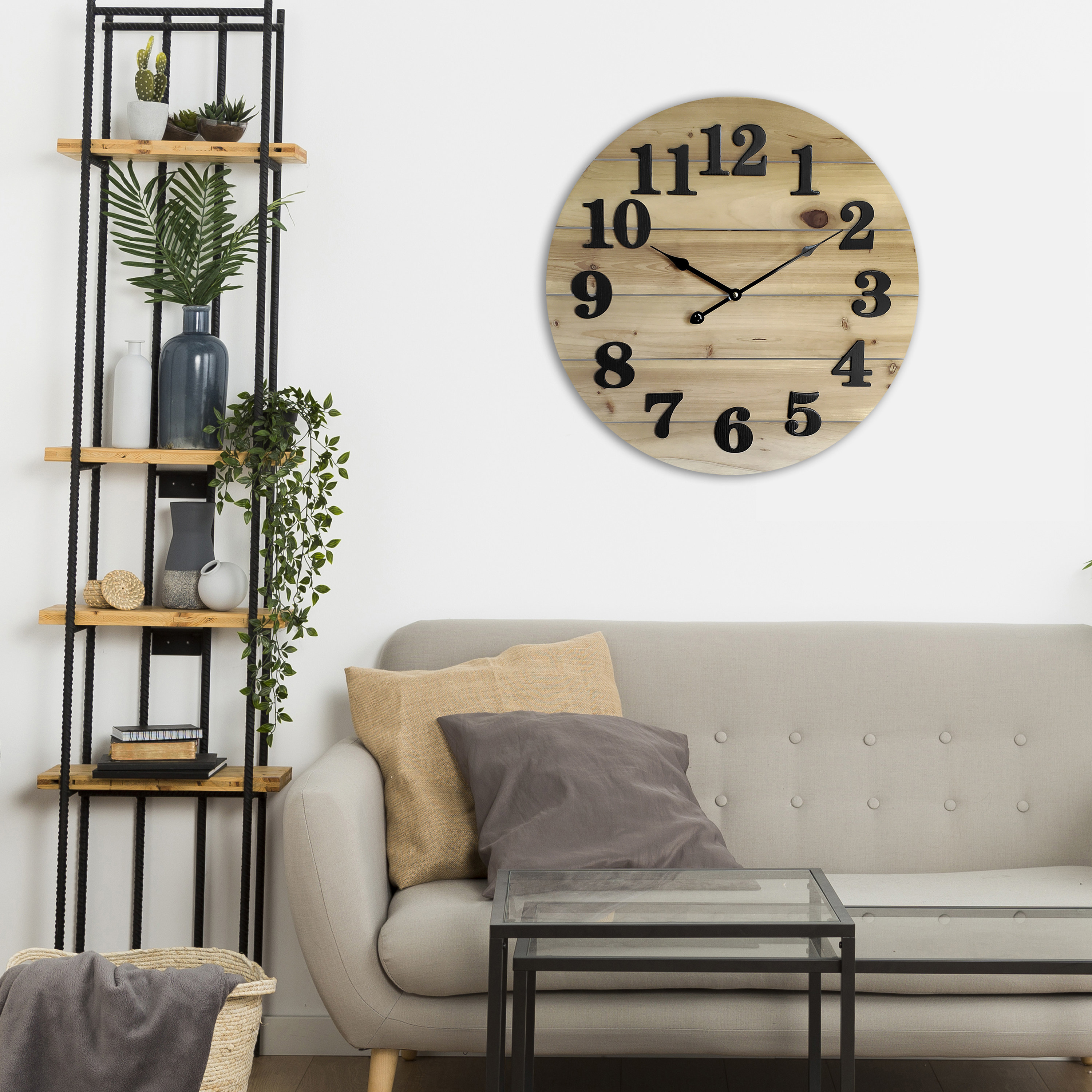 the large wooden clock on a living room wall