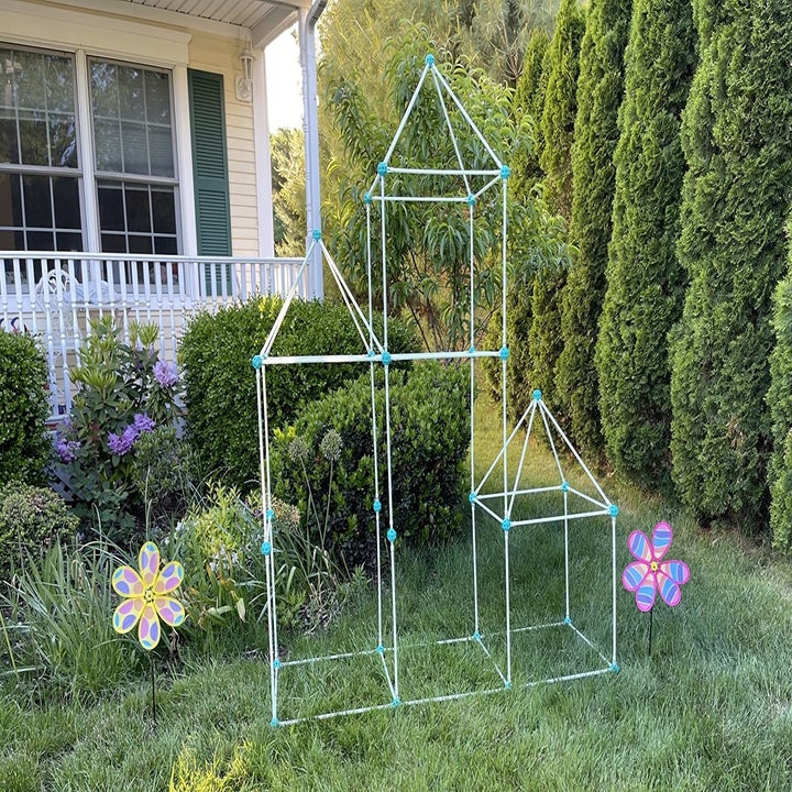 Reviewer's photo showing the castle their child built in the backyard