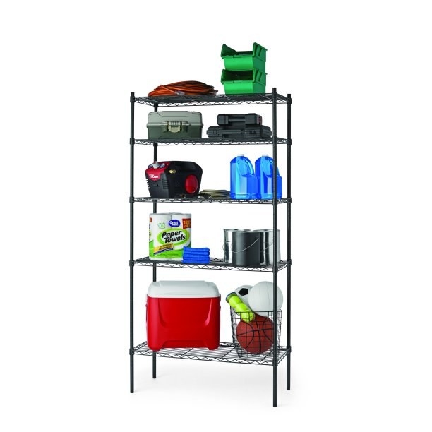 The shelf in black holding miscellaneous items