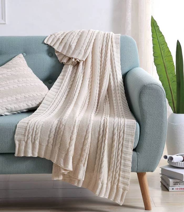 the cable knit throw in ivory