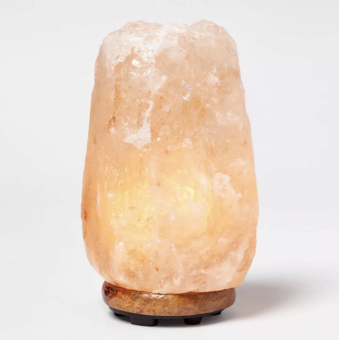 The peach colored light has a jagged salt exterior and a brown base