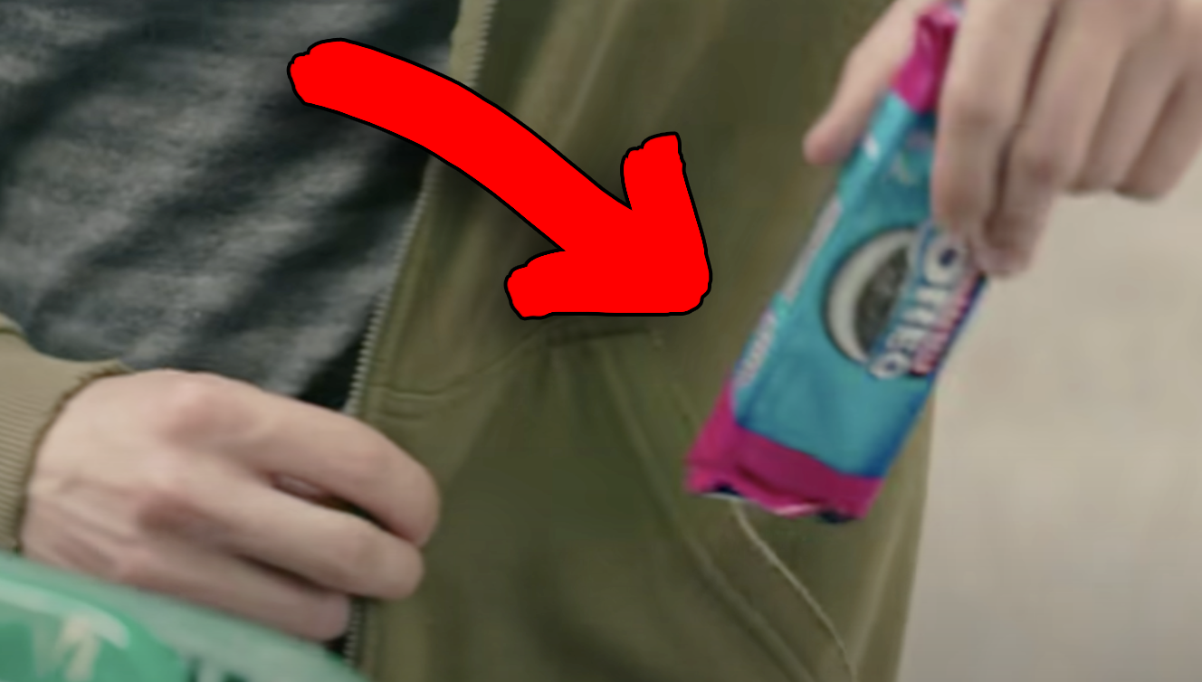 Simon pulling a package of Oreo&#x27;s out of his pocket