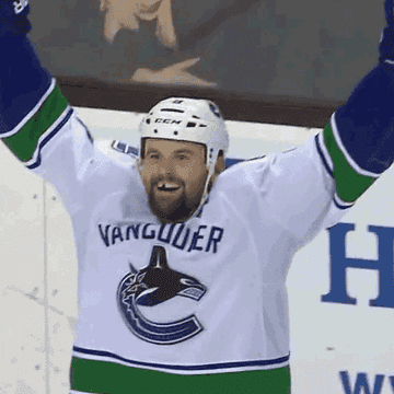 A Vancouver Canuck doing a double fist pump