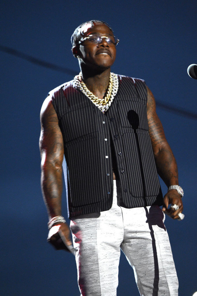 DaBaby wore a striped vest and pants