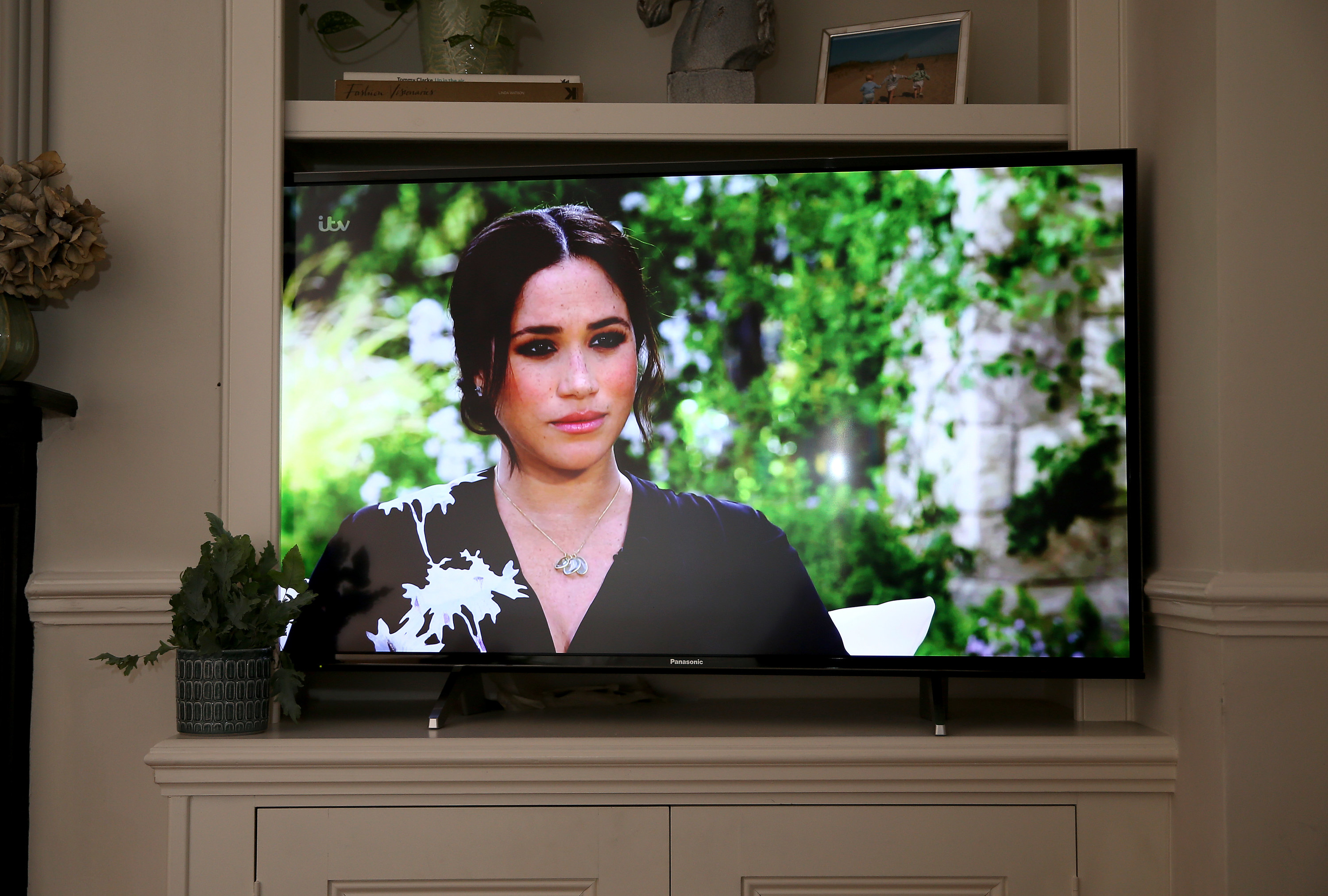 Meghan shown on a TV screen during her interview