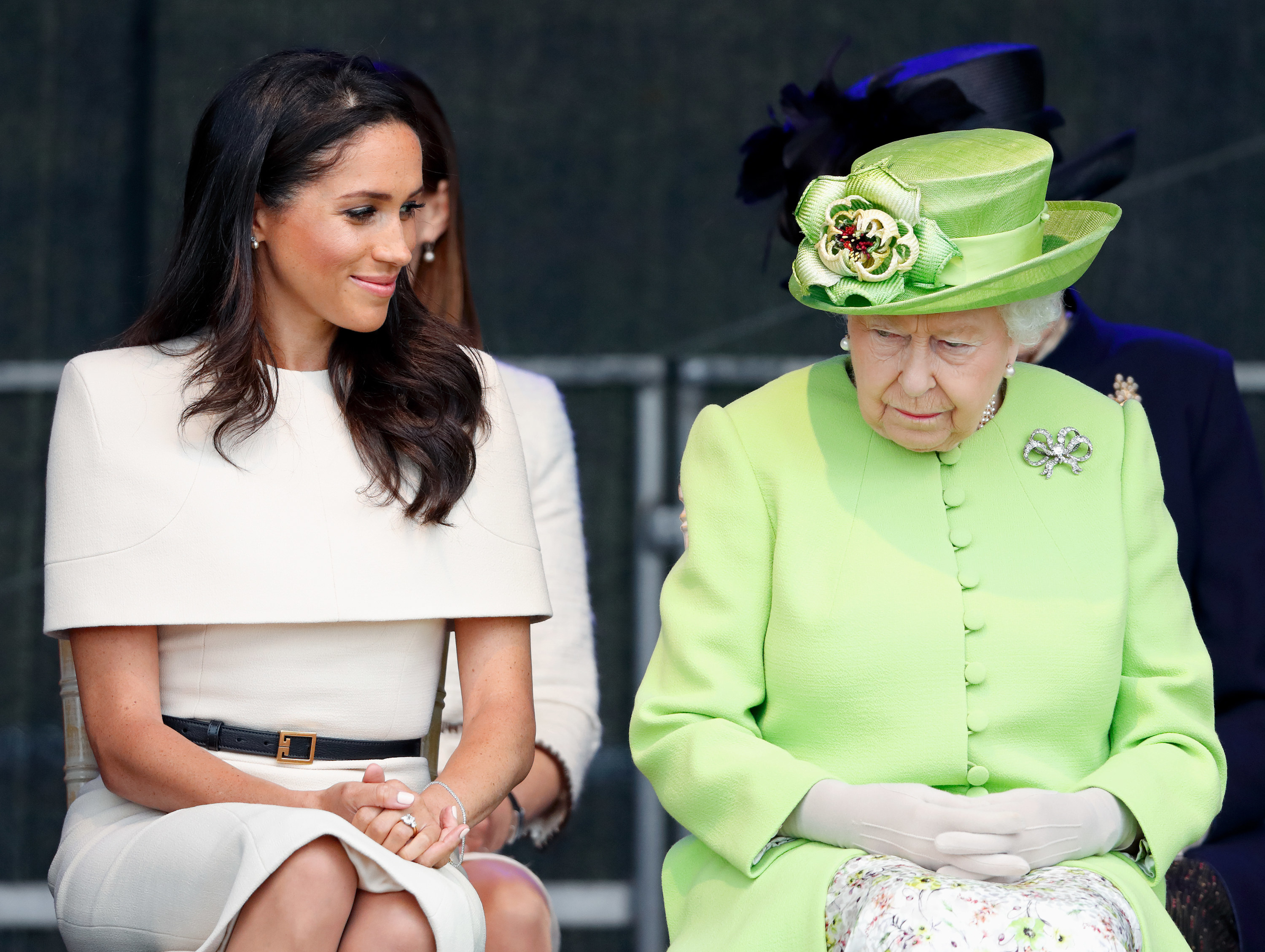 Meghan and Queen Elizabeth sitting next to each other