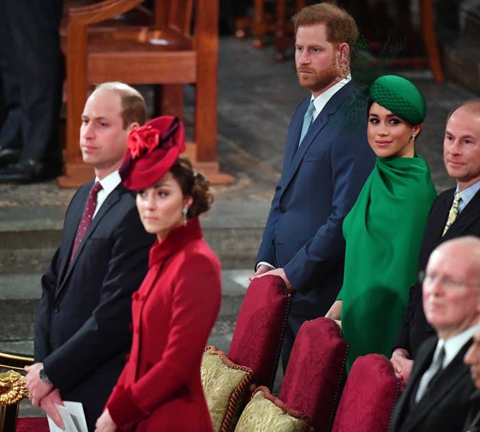 Prince William and Kate standing in front of Prince Harry and Meghan, Duchess of Sussex