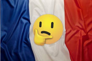 A thinking face over the French flag