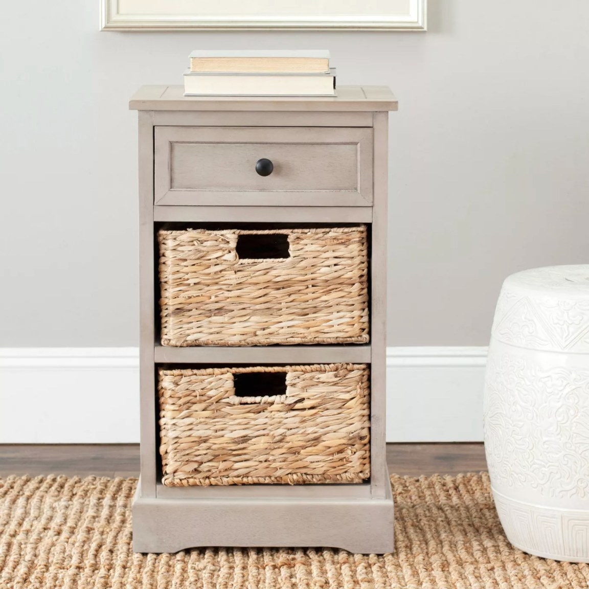The side table with drawers in gray