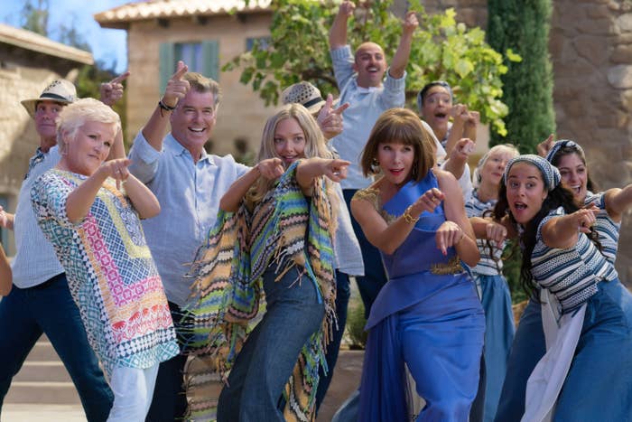 cast of Mamma Mia 2 dancing together