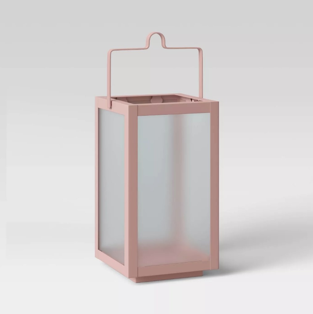 A rectangular pillar lantern candle holder in peach