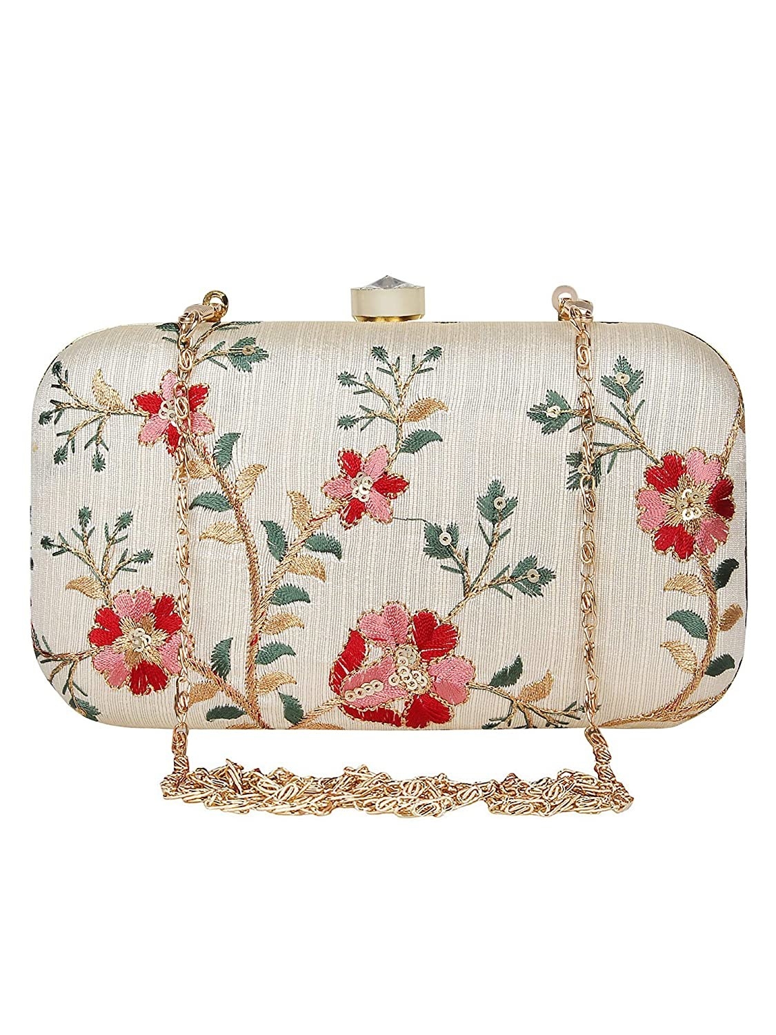 A white clutch with floral patterns on it
