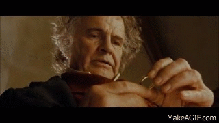 Older Bilbo Baggins looking at the ring.