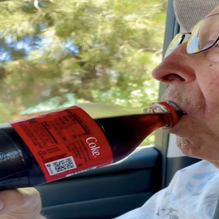 Zac Efron's grandpa drinking a bottle of Coke