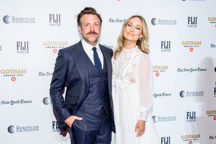 Jason Sudeikis and Olivia Wilde are photographed at a red carpet event
