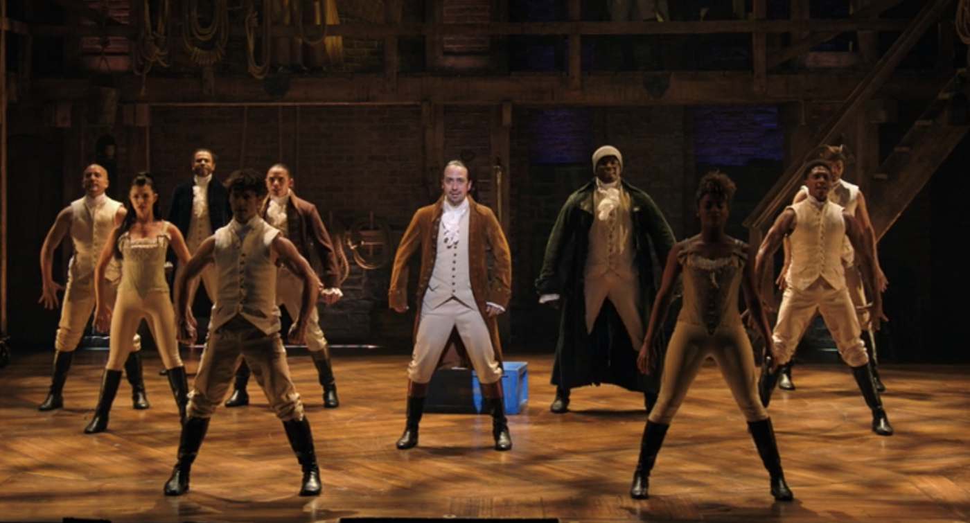 Hamilton with dancers onstage
