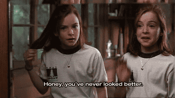 a gif of the twins from the parent trap with one saying &quot;honey, you&#x27;ve never looked better&quot;