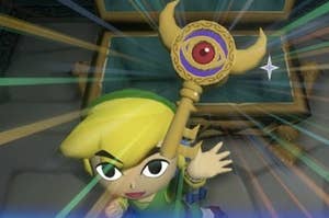 link holds a large key with an eye at the top