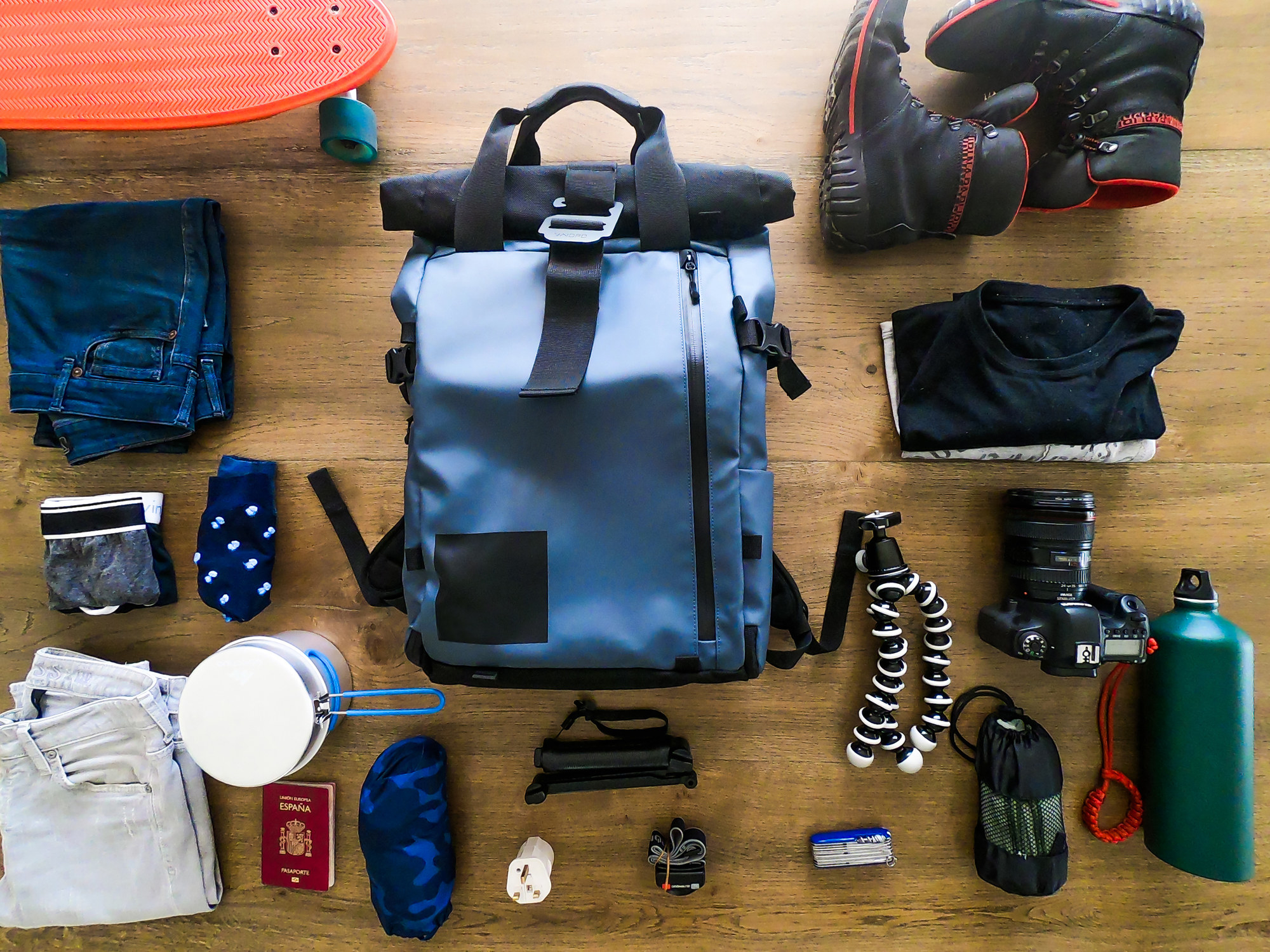 Camping supplies on a table unpacked.